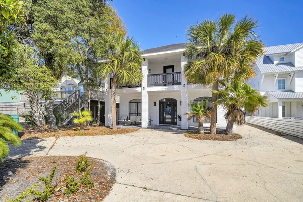 a front view of a house with a porch