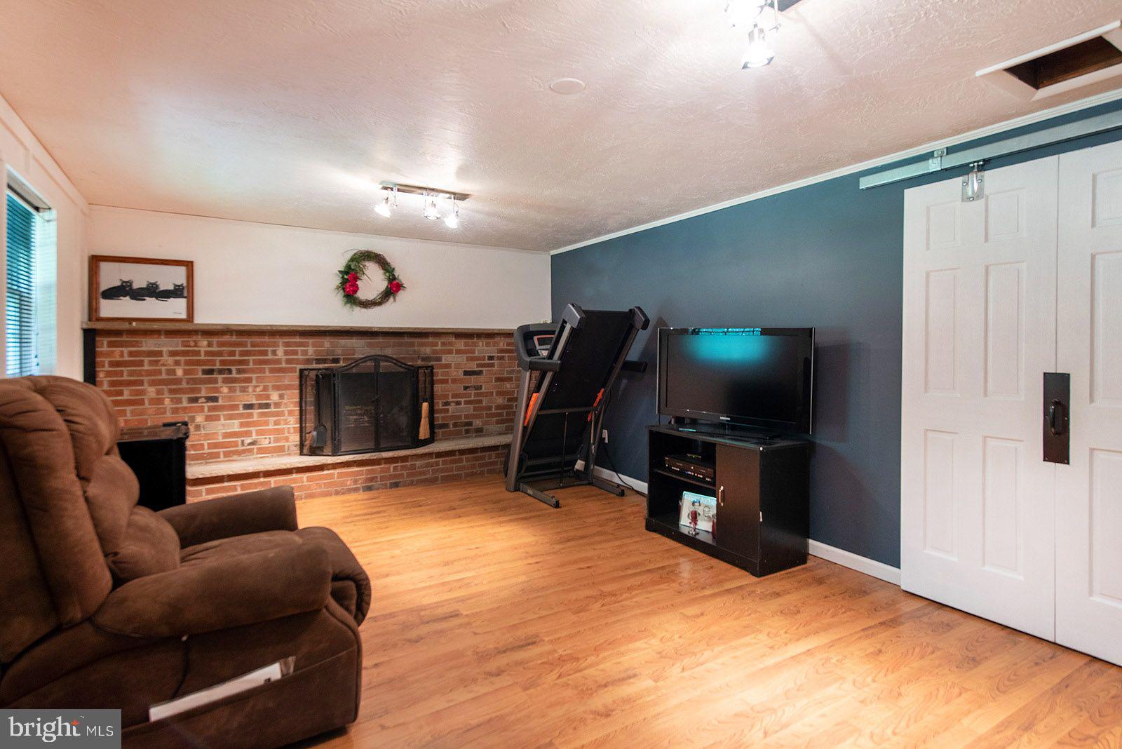 598 Rock Run Road Pottstown, PA 19465 - Photo 20 of 37 Brick wood burning Fireplace