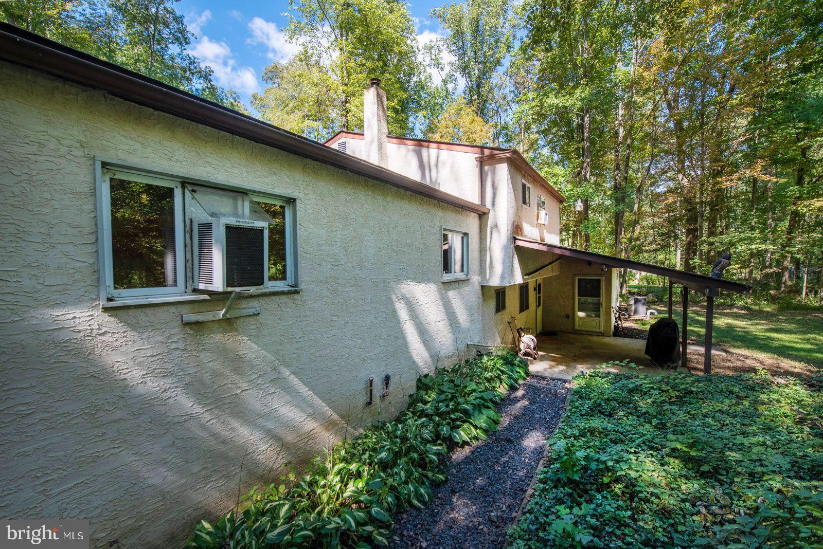 598 Rock Run Road Pottstown, PA 19465 - Photo 7 of 37 Have you noticed all the trees as you go around...