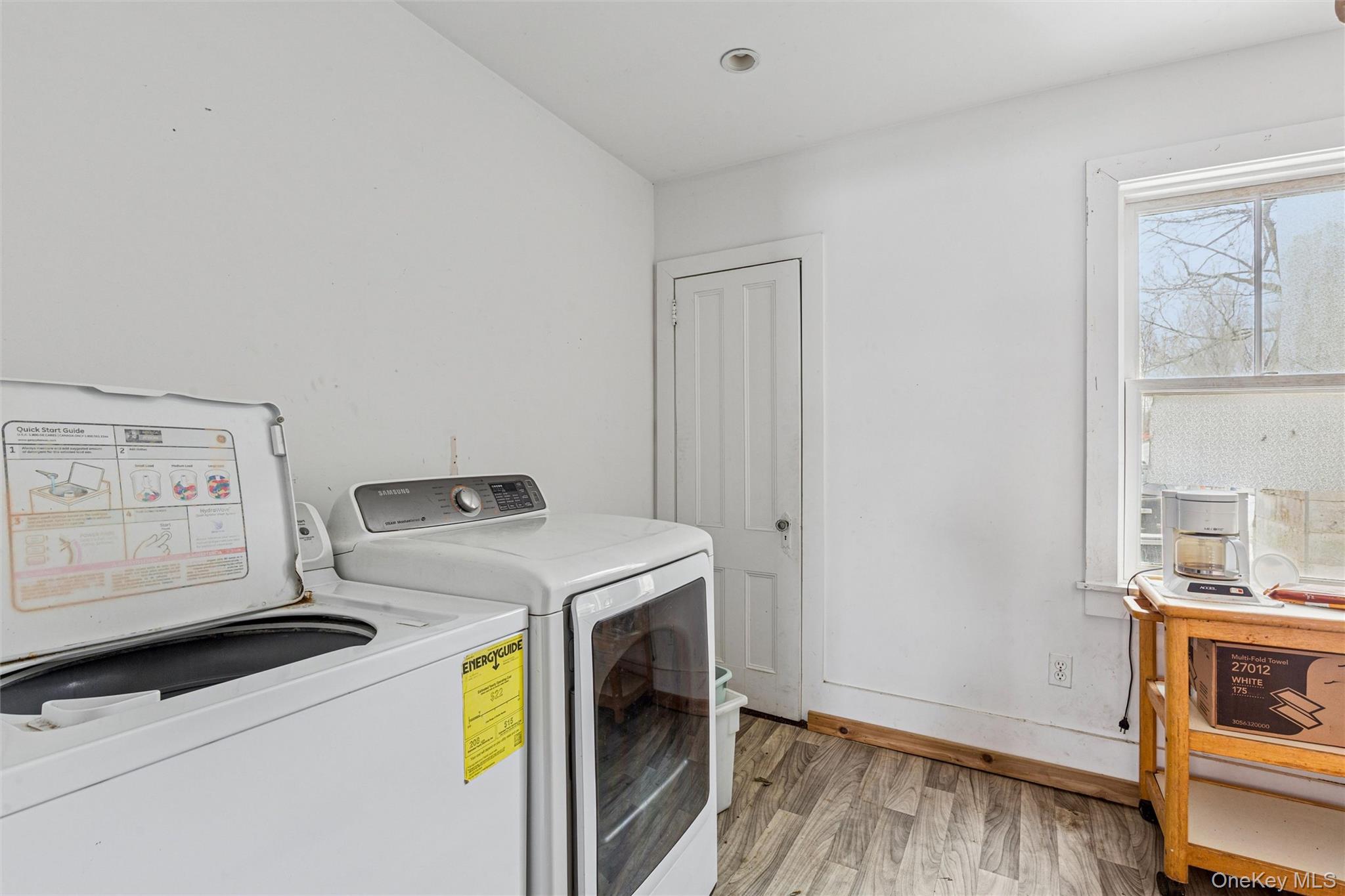 250 Main Road Riverhead, NY 11901 - Photo 19 of 31 a utility room with dryer and washer