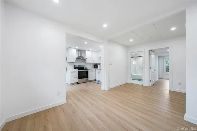 a view of kitchen with wooden floor