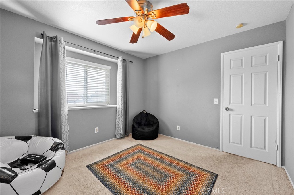 3684 North Veronica Court Rialto, CA 92377 - Photo 15 of 75 a bedroom with a bed and window