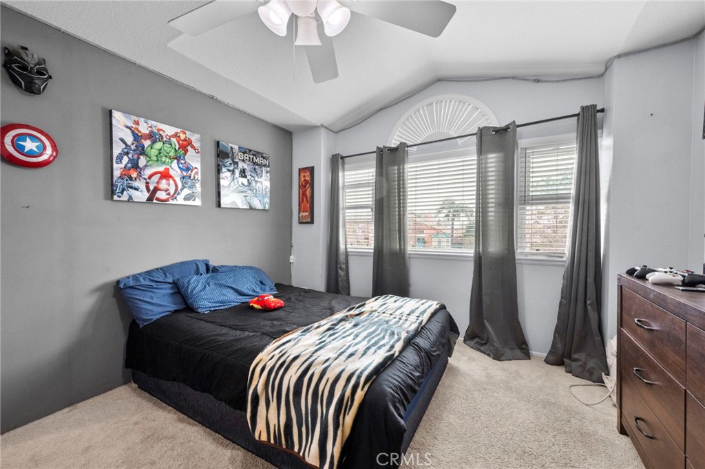 3684 North Veronica Court Rialto, CA 92377 - Photo 17 of 75 a bedroom with a bed and a window