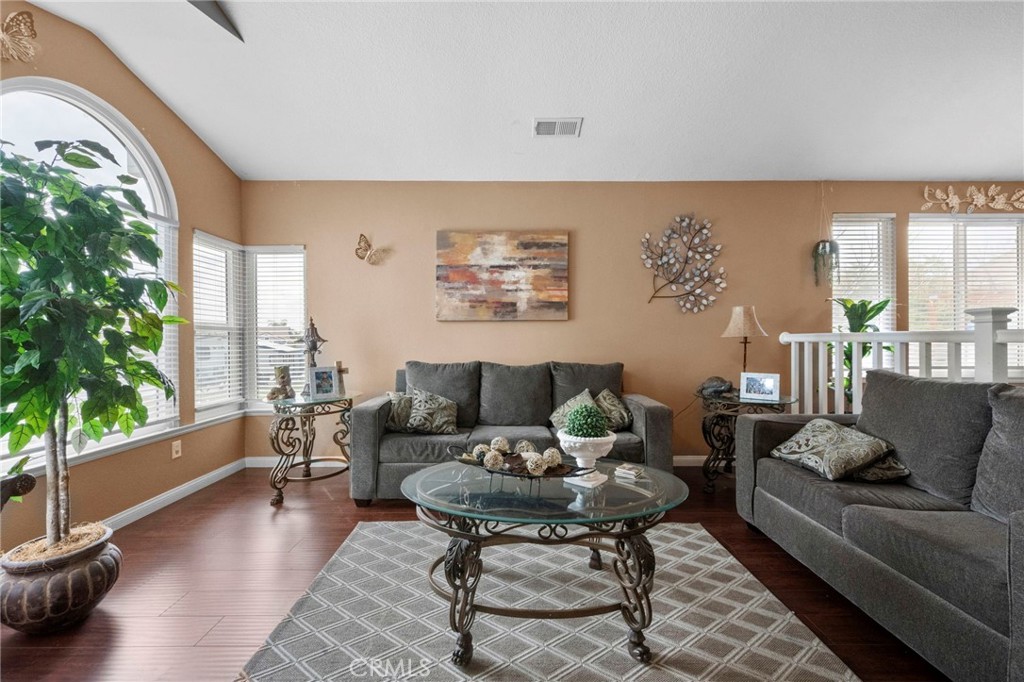 3684 North Veronica Court Rialto, CA 92377 - Photo 25 of 75 a living room with furniture and a large window