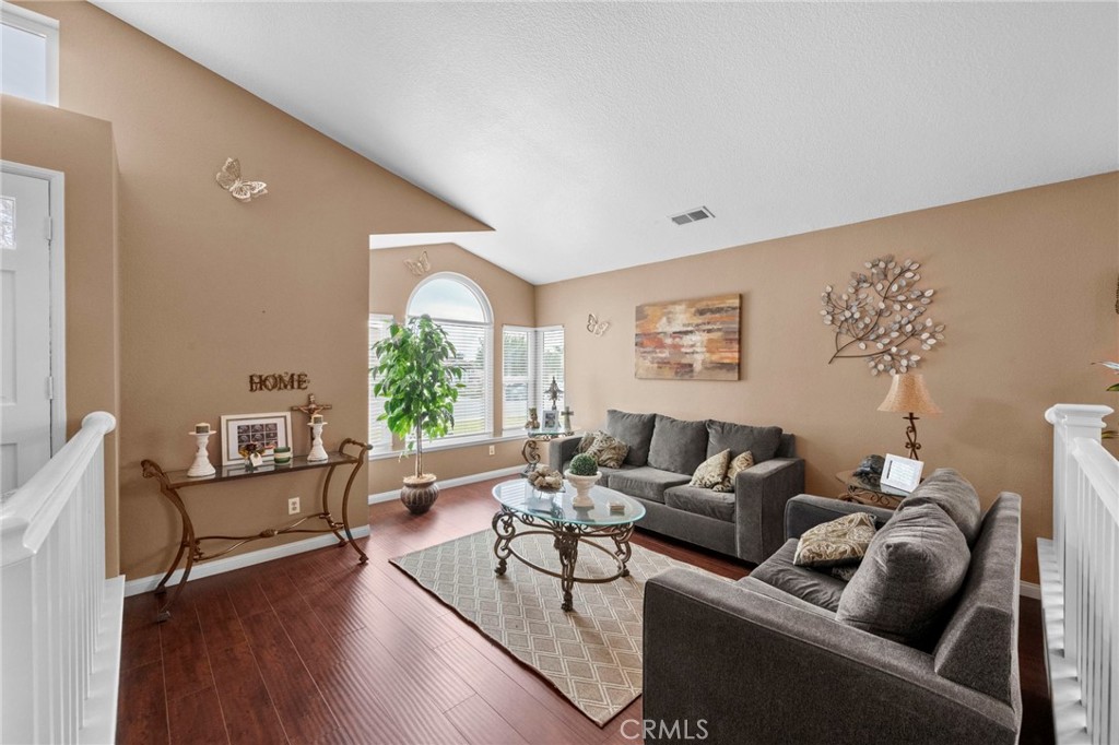 3684 North Veronica Court Rialto, CA 92377 - Photo 27 of 75 a living room with furniture and a large window