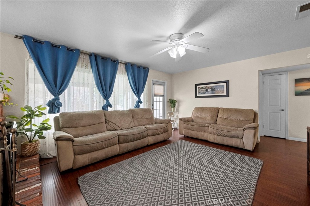 3684 North Veronica Court Rialto, CA 92377 - Photo 43 of 75 a living room with furniture and a large window