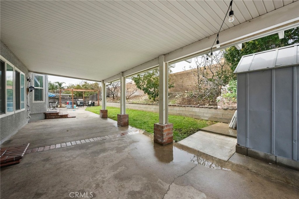 3684 North Veronica Court Rialto, CA 92377 - Photo 55 of 75 a view of a patio with a backyard