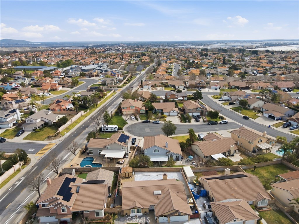 3684 North Veronica Court Rialto, CA 92377 - Photo 68 of 75 an aerial view of a city with lots of residential buildings