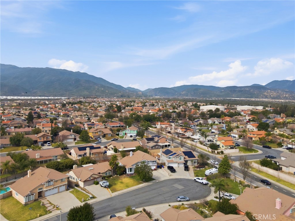 3684 North Veronica Court Rialto, CA 92377 - Photo 72 of 75 an aerial view of residential houses and outdoor space