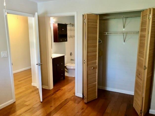 2000 Riverside Place, Unit 4 Wilton Manors, FL 33305 - Photo 35 of 40 a view of a hallway with wooden floor and closet area