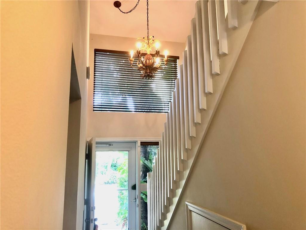 2000 Riverside Place, Unit 4 Wilton Manors, FL 33305 - Photo 7 of 40 a view of a staircase with wooden floor and stairs