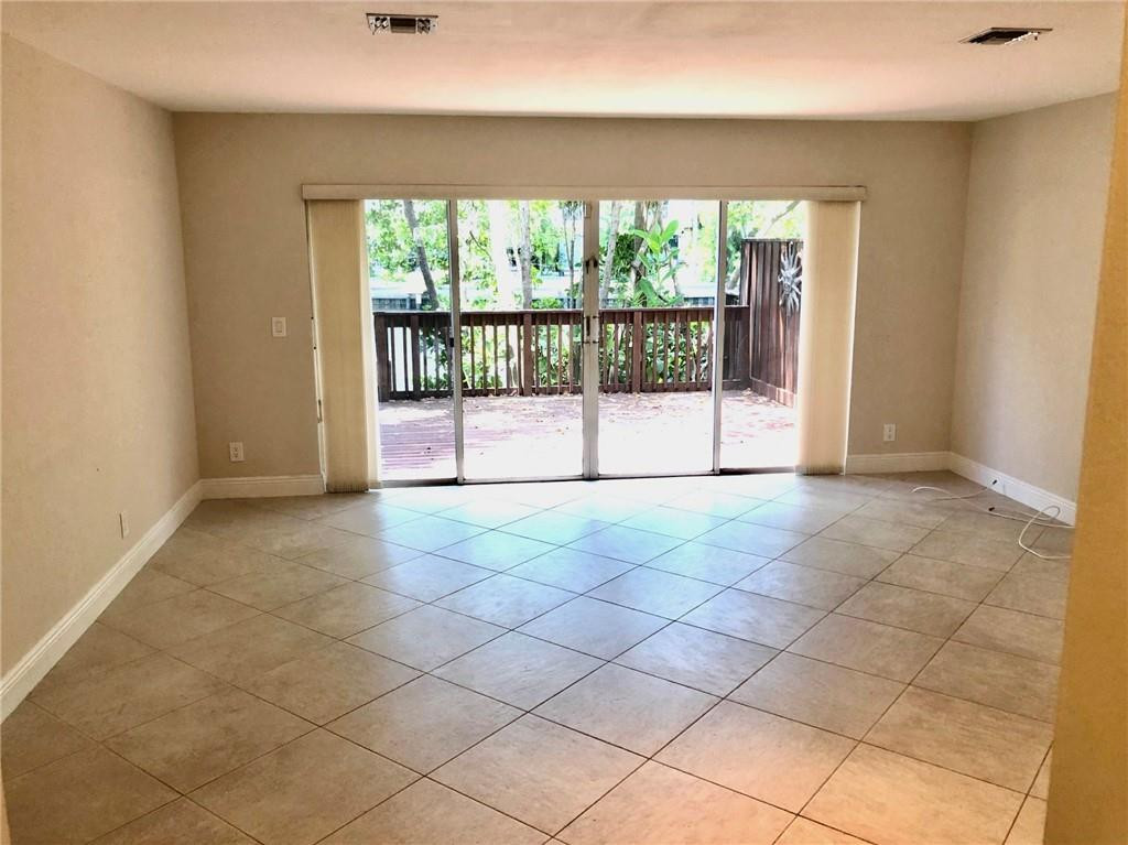 2000 Riverside Place, Unit 4 Wilton Manors, FL 33305 - Photo 8 of 40 a view of a room with a large window