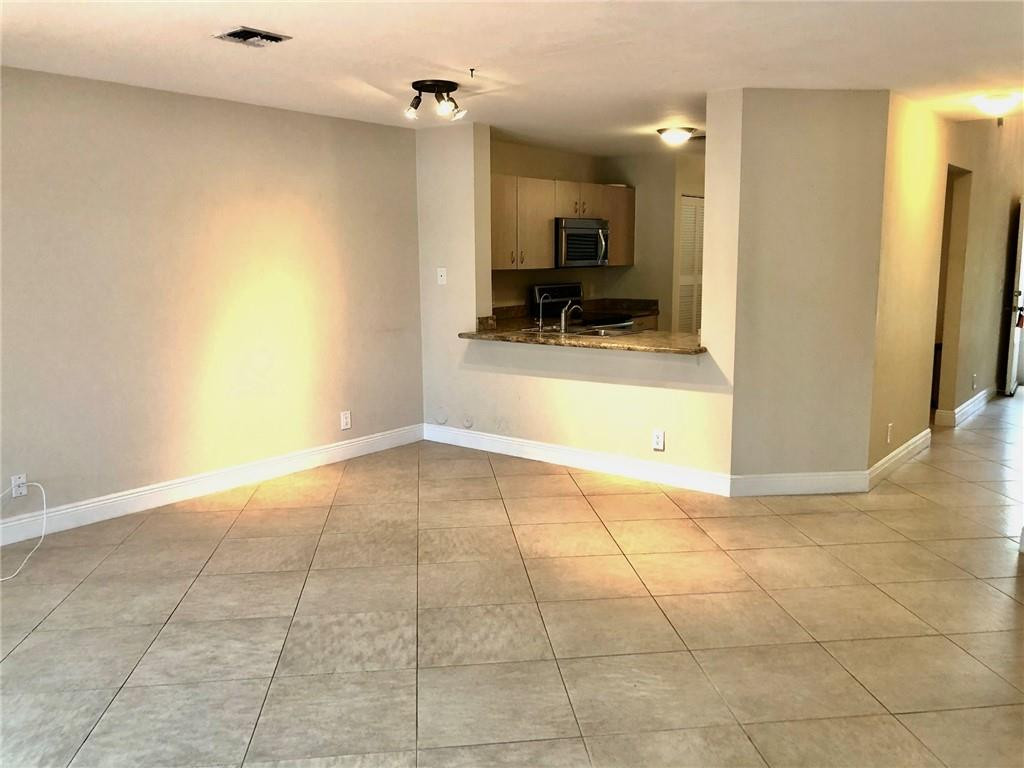 2000 Riverside Place, Unit 4 Wilton Manors, FL 33305 - Photo 9 of 40 a view of an empty room
