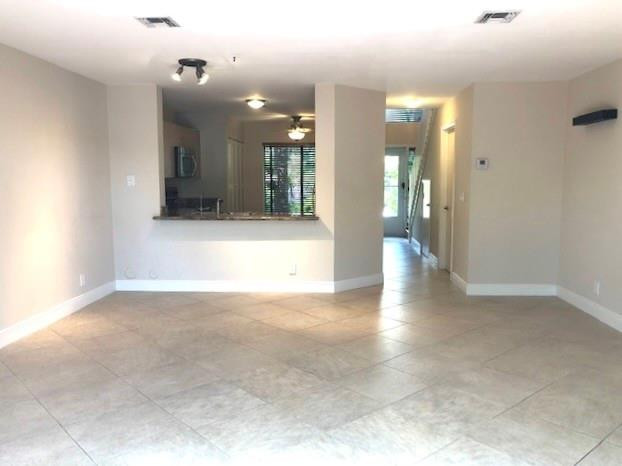 2000 Riverside Place, Unit 4 Wilton Manors, FL 33305 - Photo 10 of 40 a view of a hallway with wooden floor
