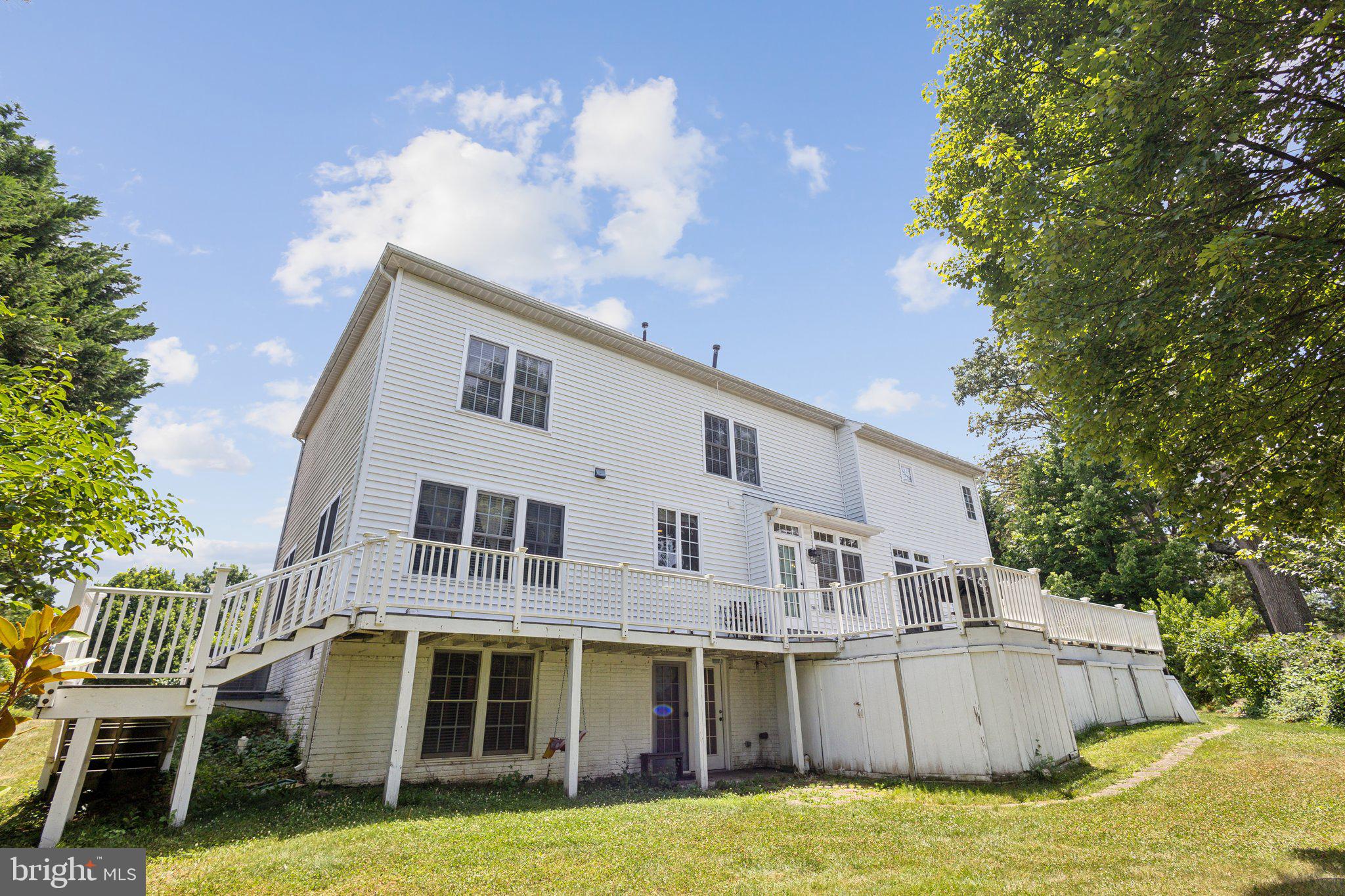 7102 Clarkson Drive Springfield, VA 22150 - Photo 20 of 26 a front view of a house with a yard