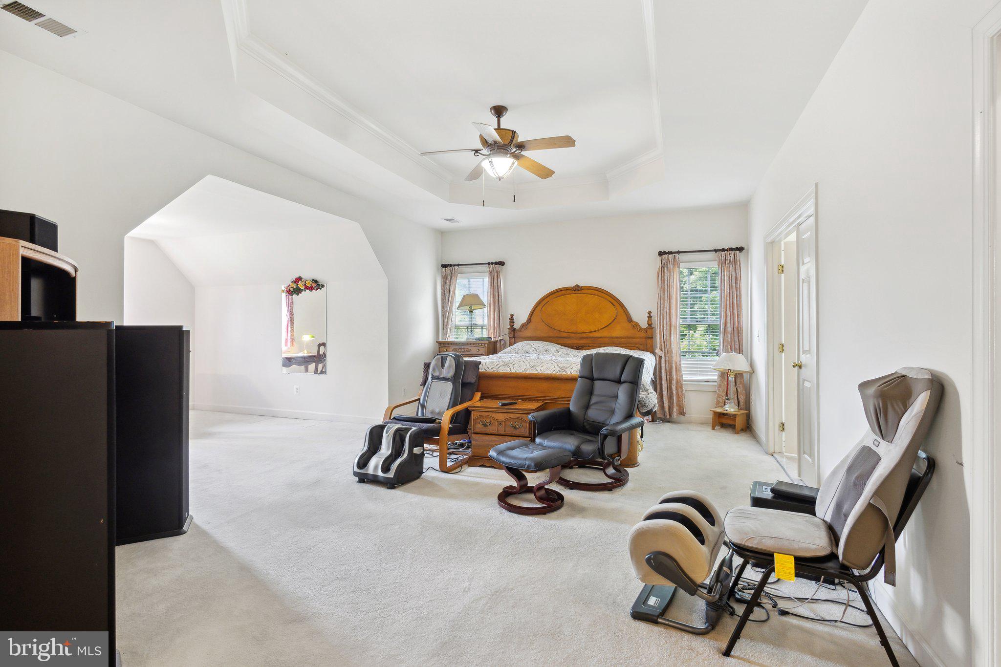 7102 Clarkson Drive Springfield, VA 22150 - Photo 9 of 26 a view of a livingroom with furniture and a gym equipment