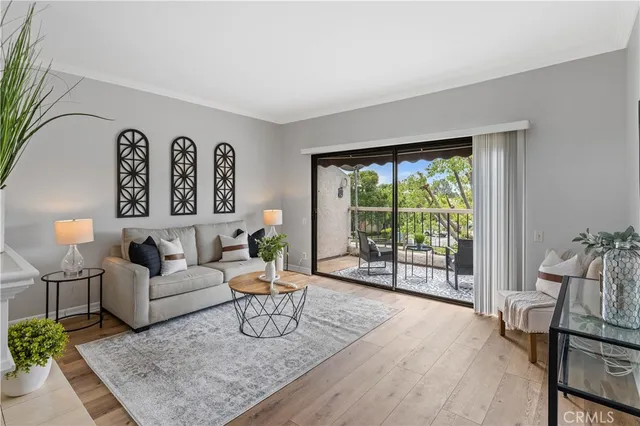 a kitchen with granite countertop a sink a stove and cabinets
