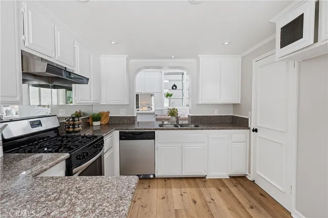 a view of a dining room with furniture and window