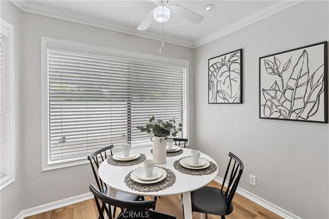 a kitchen with stainless steel appliances kitchen island granite countertop a sink and cabinets