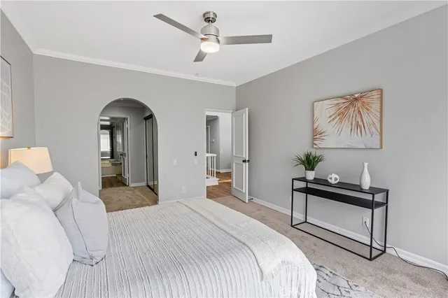 a bathroom with double vanity sinks and a bathtub