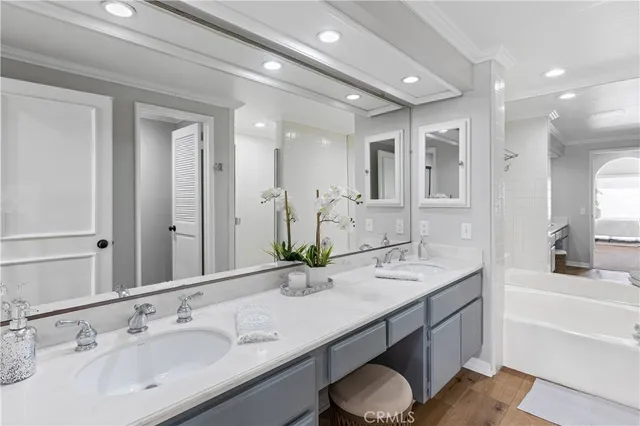 a bathroom with a bathtub shower and toilet