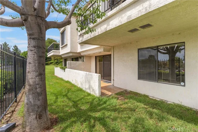 a view of a lake with a yard