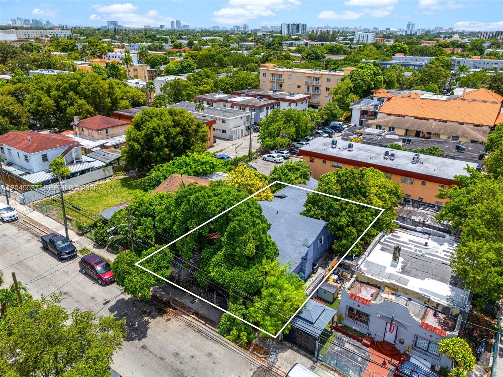 210 Southwest 13th Avenue Miami, FL 33135 - Photo 3 of 13 an aerial view of residential houses with outdoor space