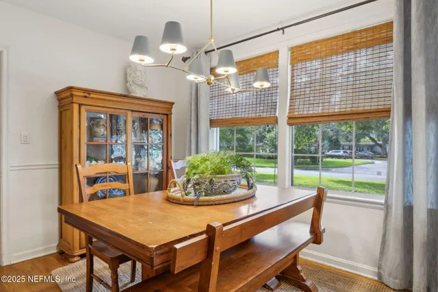 a room with a table and chairs