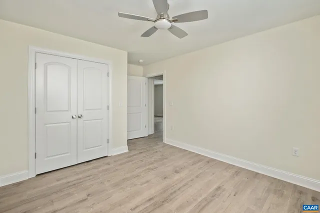 a bathroom with a sink a toilet and tub