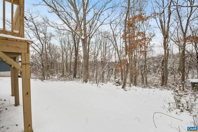 a view of snow on a road