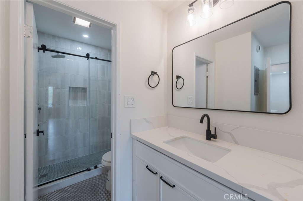 8163 Redlands Street, Unit 73 Playa del Rey, CA 90293 - Photo 10 of 23 a bathroom with a sink and mirror