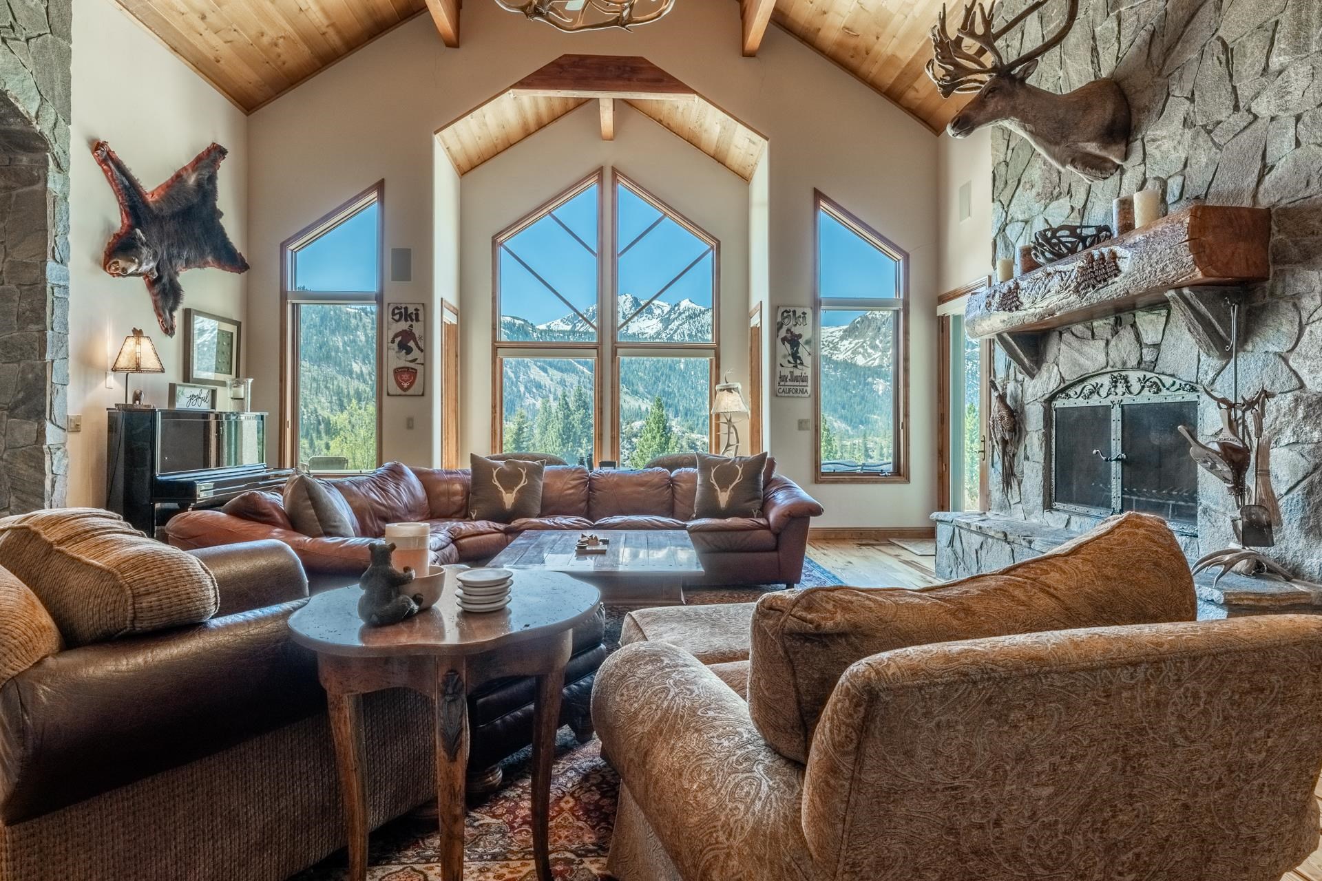 45 Skyline Road June Lake, CA 93529 - Photo 2 of 58 a living room with furniture fireplace and a large window