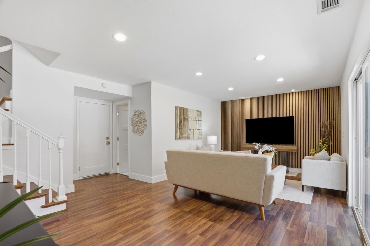 5888 Lean Way San Jose, CA 95123 - Photo 15 of 54 a living room with furniture and a flat screen tv