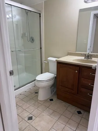 a view of a hallway to rooms