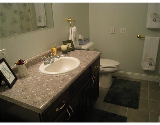 4 Paxton Way, Unit 2 Windham, ME 04062 - Photo 13 of 17 Bathroom. Second bathroom with tile...