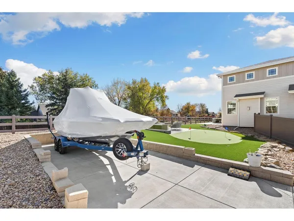 a view of a house with swimming pool