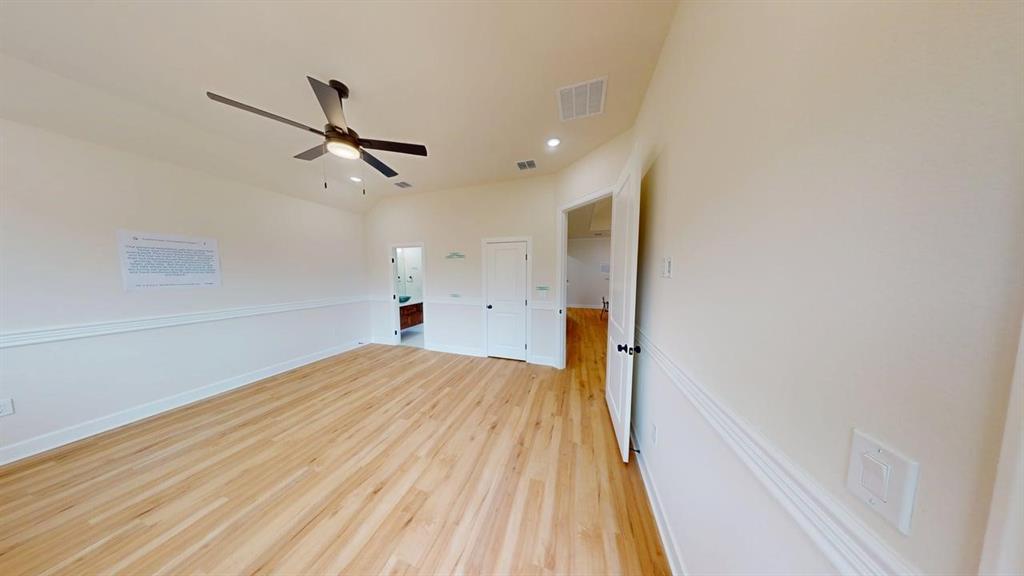 2509 Windmill Lane Longview, TX 75601 - Photo 15 of 35 Room featuring light wood finished floors, a ceiling fan, and recessed lighting