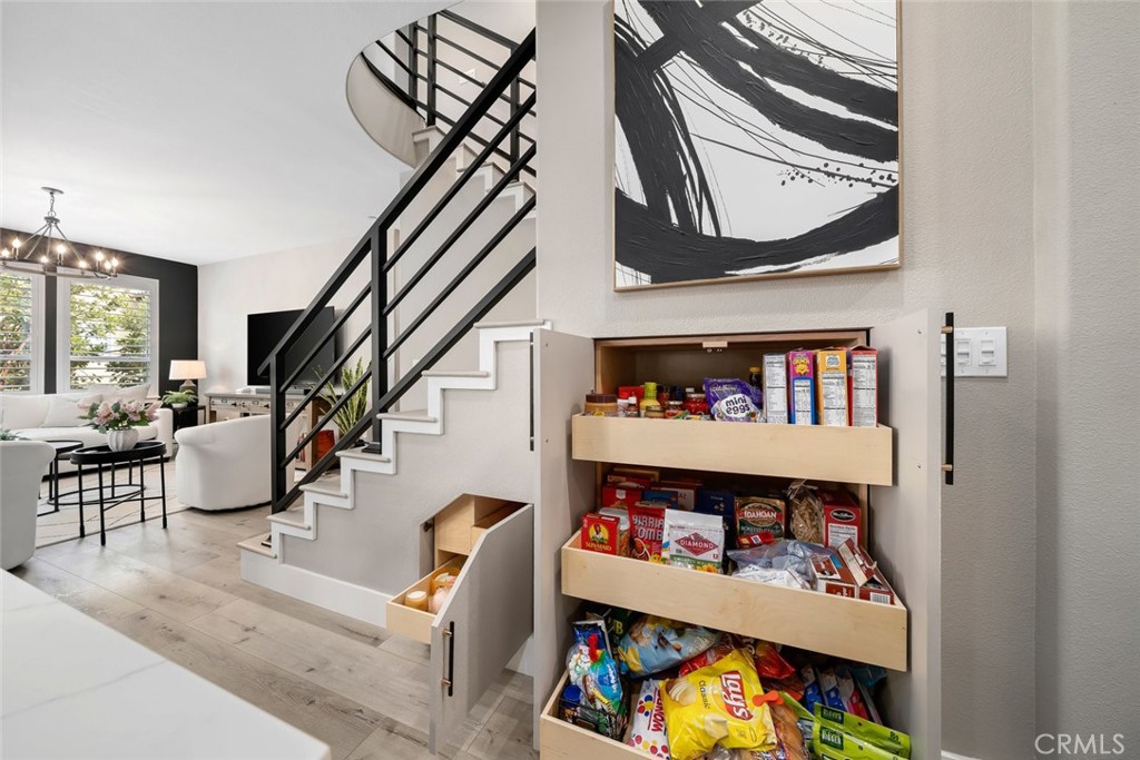 1177 Spring Azure Way, Unit 55 Nipomo, CA 93444 - Photo 16 of 75 a living room with furniture and a baby crib