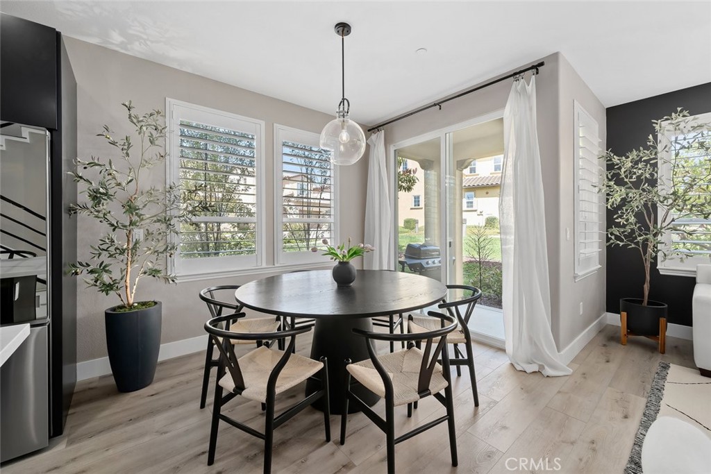 1177 Spring Azure Way, Unit 55 Nipomo, CA 93444 - Photo 18 of 75 a view of a dining room with furniture window and outside view