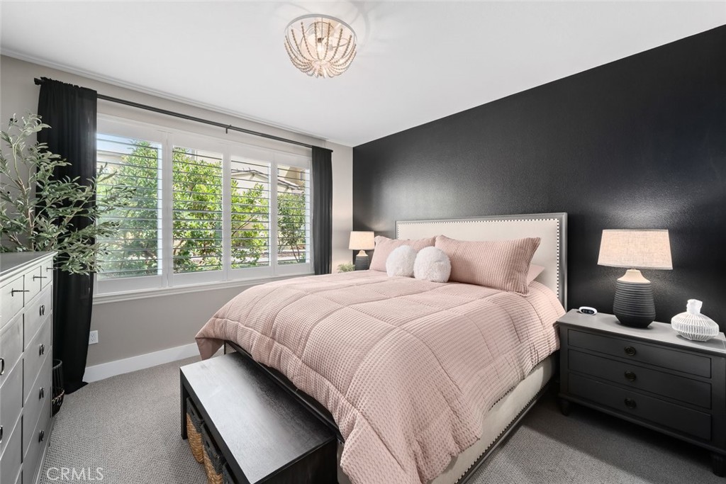 1177 Spring Azure Way, Unit 55 Nipomo, CA 93444 - Photo 22 of 75 a bedroom with a bed and a window