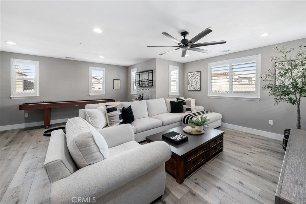 1177 Spring Azure Way, Unit 55 Nipomo, CA 93444 - Photo 29 of 75 a living room with furniture and a large window