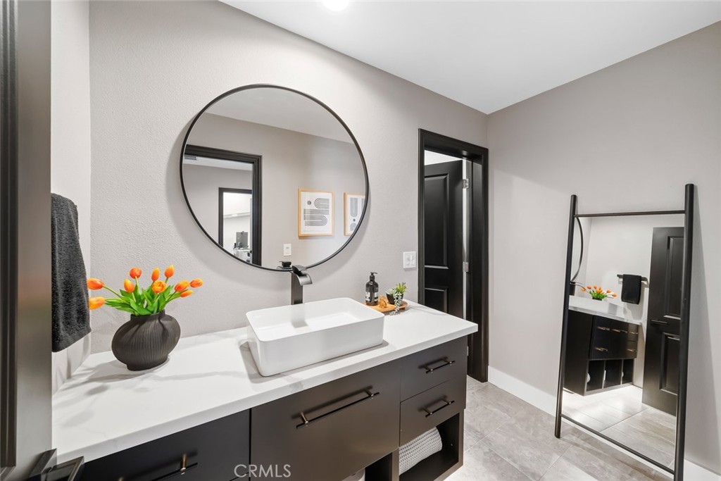 1177 Spring Azure Way, Unit 55 Nipomo, CA 93444 - Photo 37 of 75 a living room with furniture and a mirror