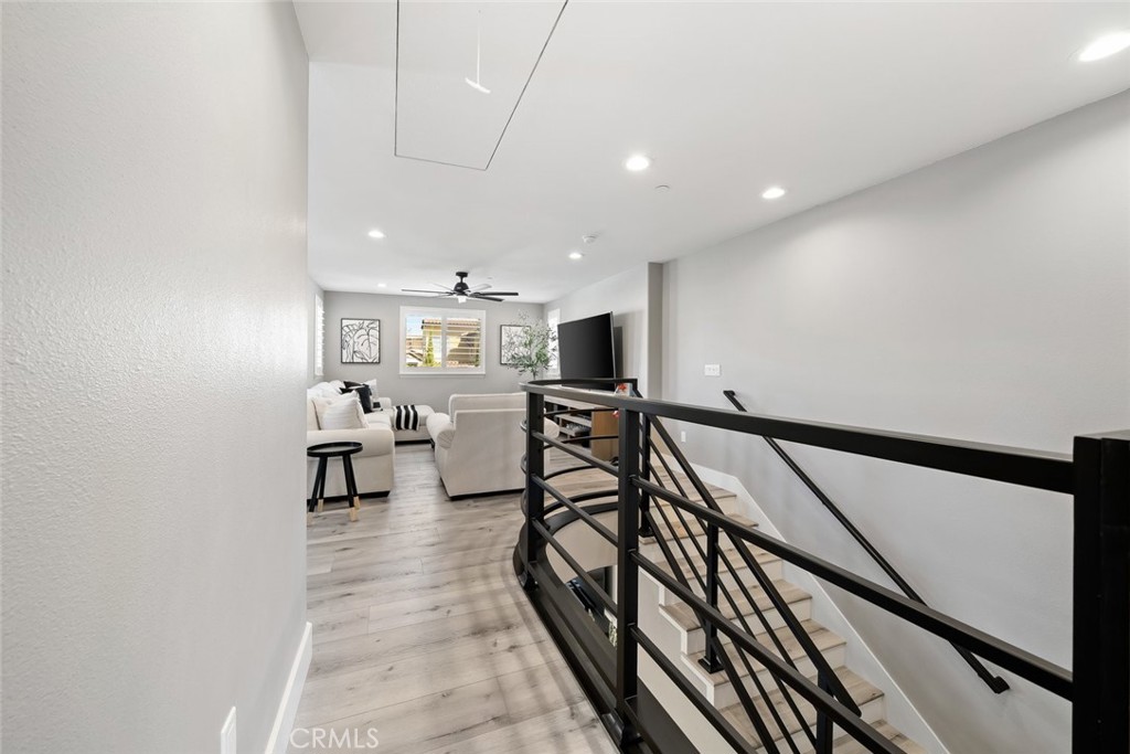 1177 Spring Azure Way, Unit 55 Nipomo, CA 93444 - Photo 47 of 75 a view of a livingroom with furniture and a flat screen tv
