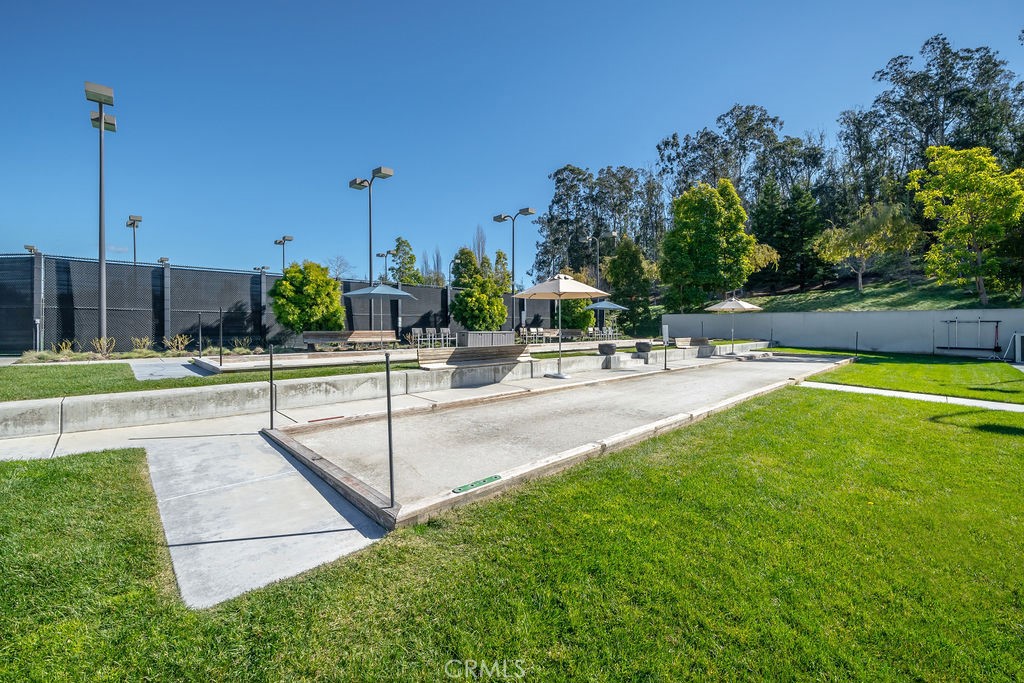 1177 Spring Azure Way, Unit 55 Nipomo, CA 93444 - Photo 75 of 75 a swimming pool with outdoor seating and yard