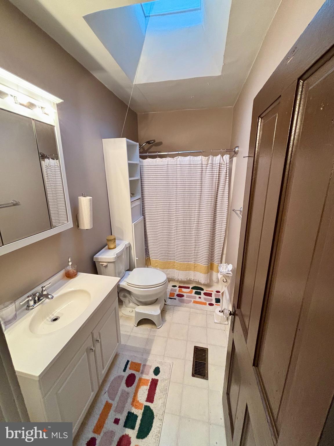 827 Belgian Avenue Baltimore, MD 21218 - Photo 6 of 15 a bathroom with a sink toilet and shower