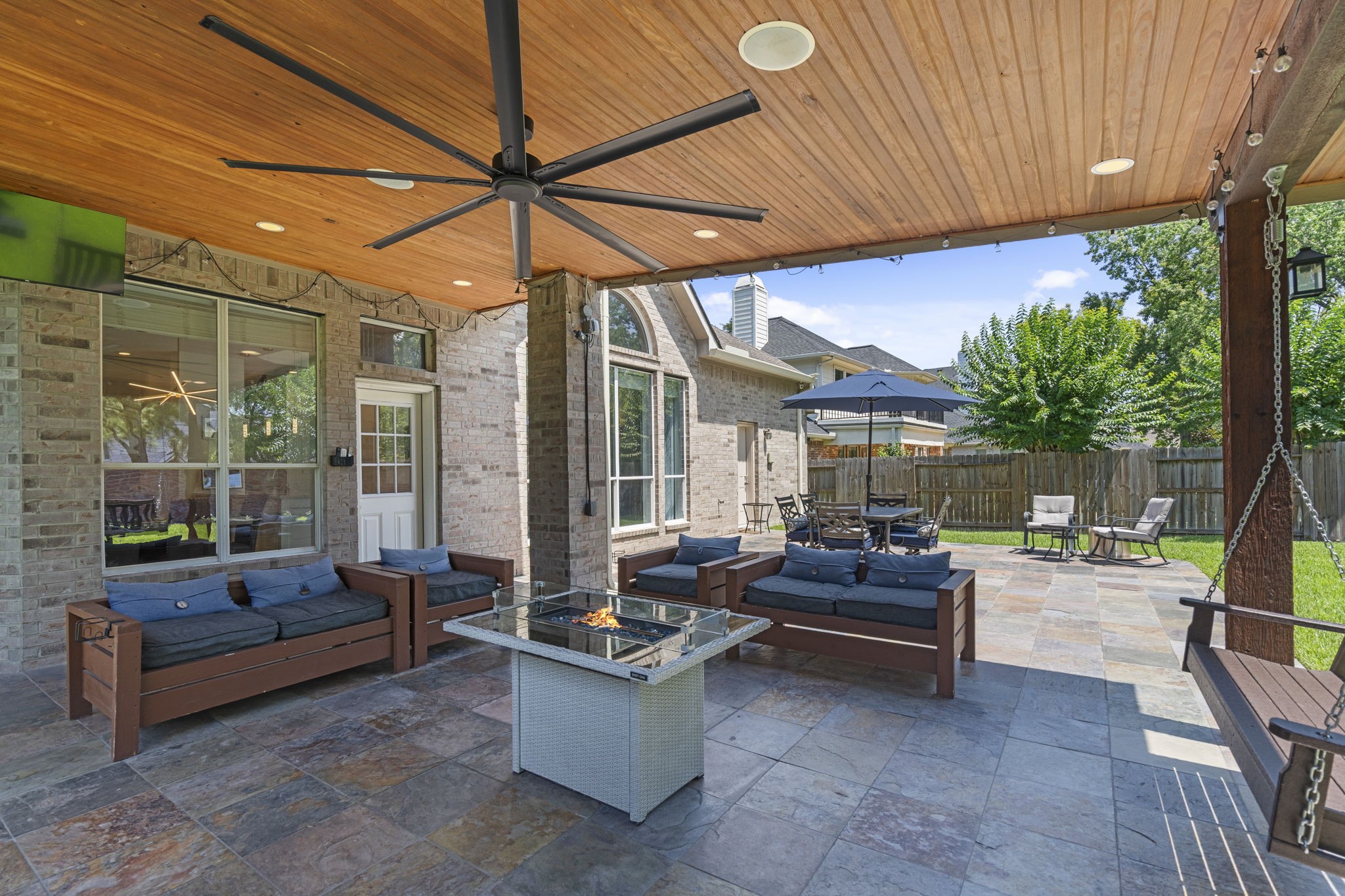 14718 Ramblebrook Humble, TX 77396 - Photo 28 of 38 Covered outdoor living with a direct connection to the backyard.