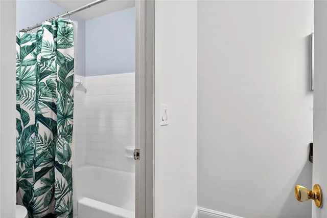 an aerial view of a house with a ocean view