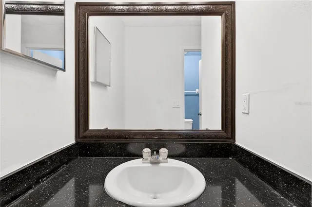 an aerial view of houses with outdoor space