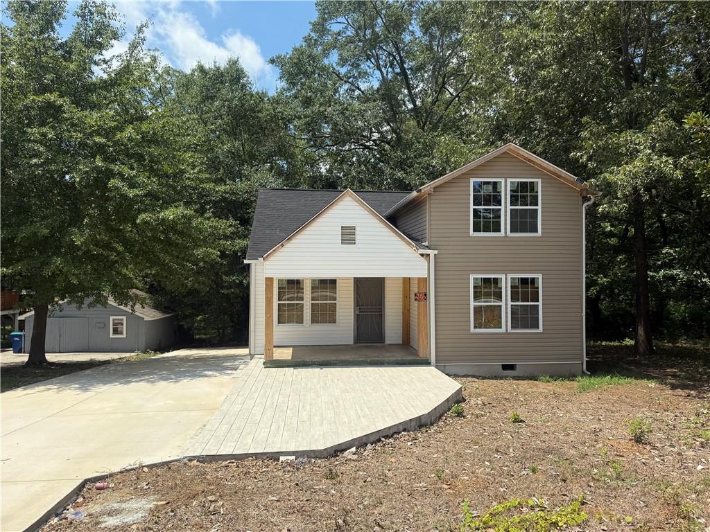 5725 Stonewall Tell Road Atlanta, GA 30349 - Photo 1 of 16