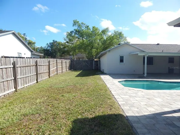 a house view with a garden space